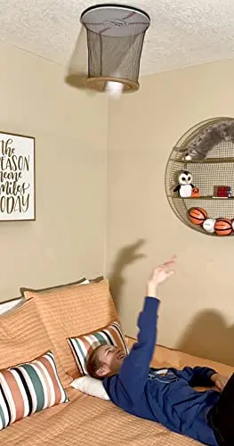 Ceiling Strike indoor baseball game with ceiling-mounted net