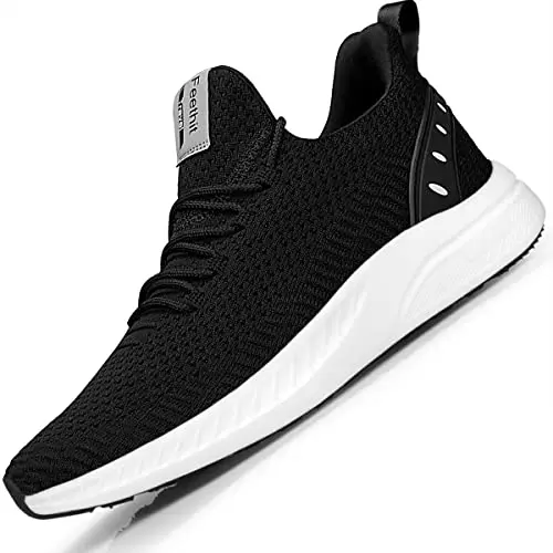 Feethit slip-on walking shoes in black and white
